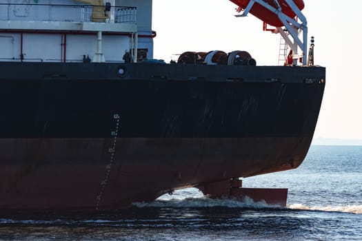 Black cargo ship sailing from the Baltic sea