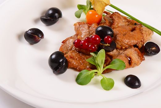 Turkey fillet stewed in sauce with grapes