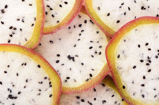 Fresh sliced white dragon fruit close up