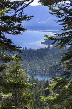 An image looking down at South Lake Tahoe from a local trail. The smaller lake below is Cascade lake, which is private.