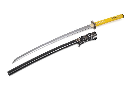 Japanese sword and scabbard on white background wrapped handle by yellow leather  and ray skin on scabbard
