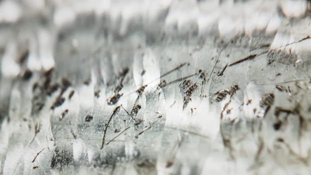 Abstract faceted crystallized background. Metal crystal design. Selective focus