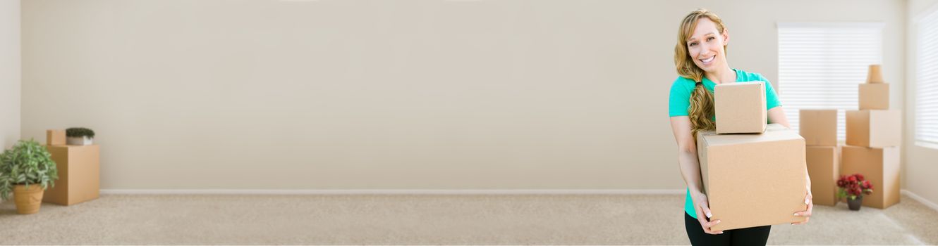 Banner of Happy Young Adult Woman Holding Moving Boxes In Empty Room In A New House.