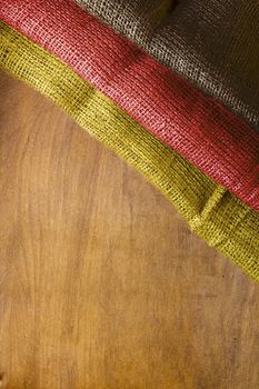 Three-color flag of Germany on a wooden background.