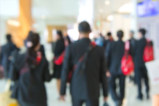 blur People Walking in the corridor of business center.