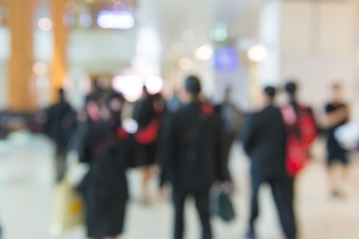 blur People Walking in the corridor of business center.