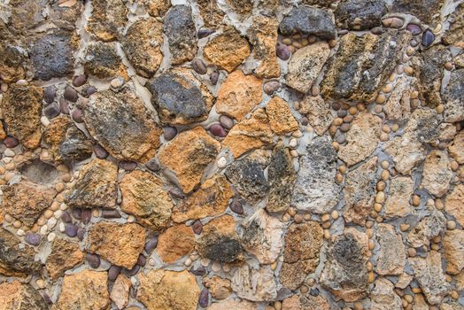 Background of stone wall texture abstract for design.