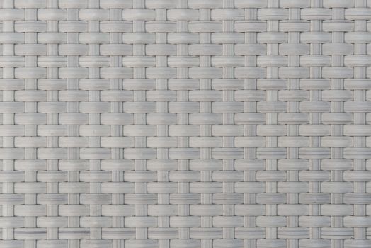 texture of plastic rattan weaving design for background.