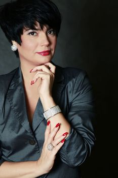 Portrait of the beautiful brunette in studio