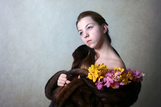 Portrait of the girl in a mink fur coat