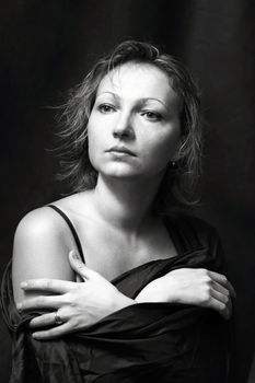 Portrait of the beautiful woman in studio