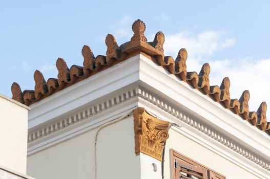 stoneware roof decoration in old building