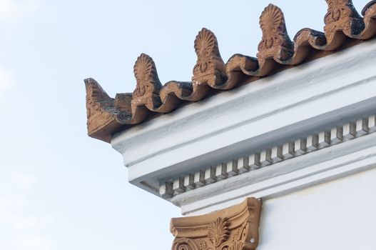 stoneware roof decoration in old building