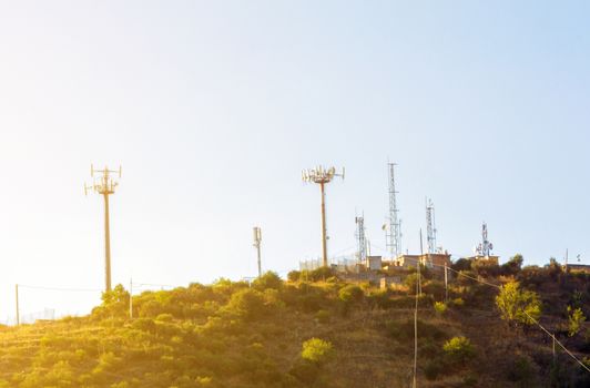 Antennas of radio and telephone communication on the top of the hill.