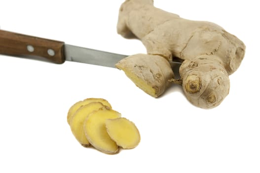Ginger root with knife