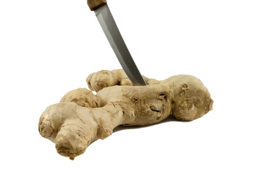 Ginger root with knife