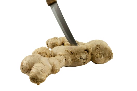 Ginger root with knife