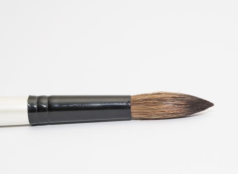 close up of a round artists paint brush