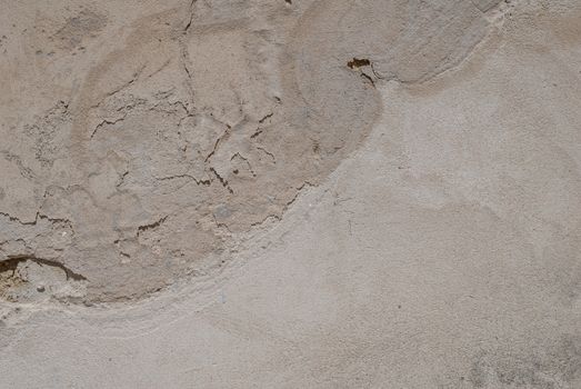 fragment of a concrete wall that for a long time exposed to different climatic conditions