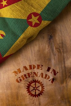 Stamp Made in Grenada, a poster with the national flag of Grenada.