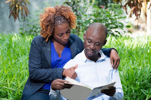 This young couple appreciates the information found in this magazine.
