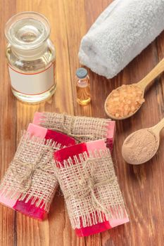 Red handmade fruit soap on a wooden background