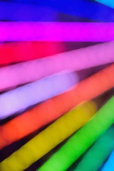 Blur texture of colorful carnival lights in vertical frame