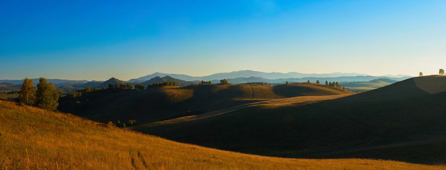 Beauty summer evening in the mountains in Altay, panoramic picture