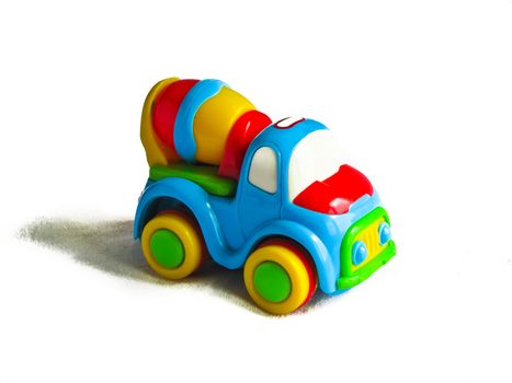 a small toy car isolated on white background with shadow