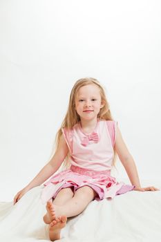 the beautiful little girl on the isolated background