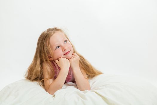 the beautiful little girl on the isolated background