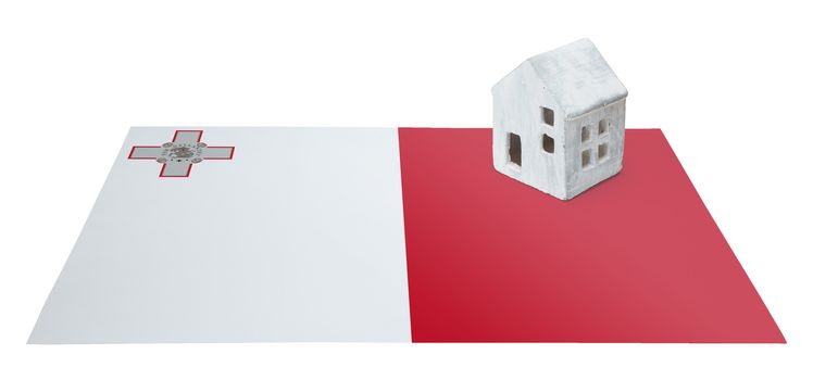 Small house on a flag - Living or migrating to Malta