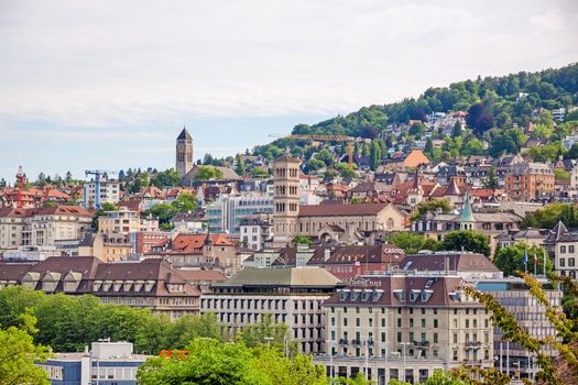 Zurich, Switzerland - June 10, 2017: View over Zuerich, Liebfrauen church, Cinema Capitol, and Central Plaza Hotel.