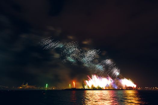 Colored New Year fireworks in centre of Riga