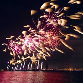 Colored New Year fireworks in centre of Riga