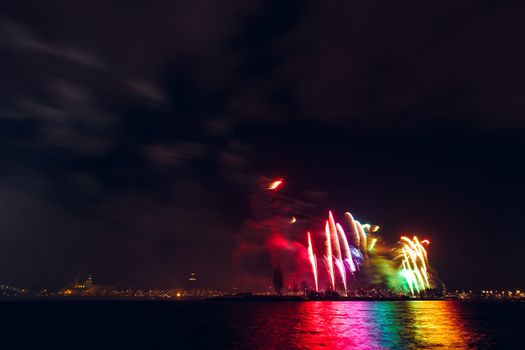 Colored New Year fireworks in centre of Riga