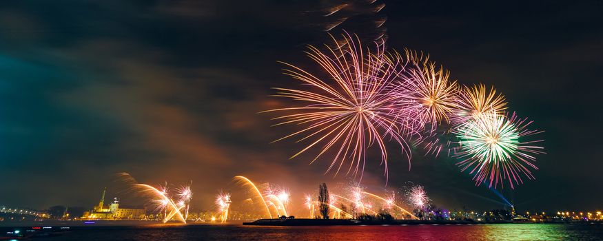 Colored New Year fireworks in centre of Riga