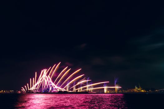 Colored New Year fireworks in centre of Riga