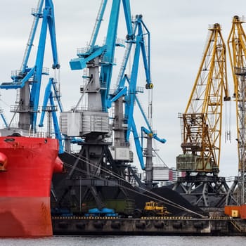 Blue cargo cranes in the port of Riga, Europe