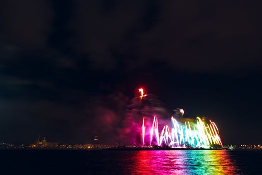 Colored New Year fireworks in centre of Riga