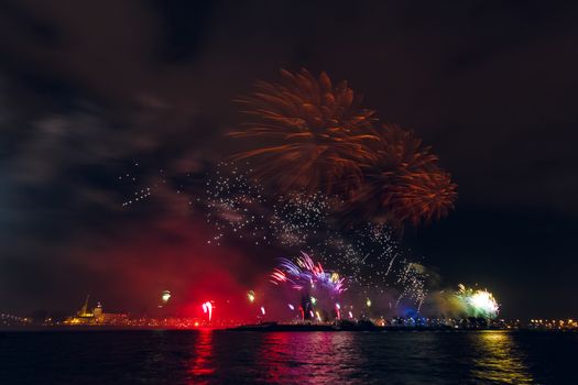 Colored New Year fireworks in centre of Riga