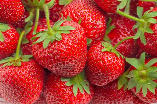 Background of the fresh ripe garden strawberries closeup
