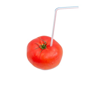 Big fresh ripe tomato and bendable drinking straw inserted into it on a light background
