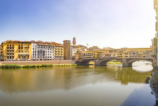 Medieval stone bridge Ponte Vecchio over the Arno River in Florence, Tuscany, Italy. Florence is a popular tourist destination of Europe