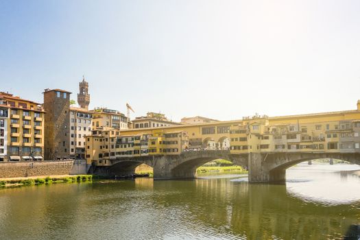 Medieval stone bridge Ponte Vecchio over the Arno River in Florence, Tuscany, Italy. Florence is a popular tourist destination of Europe