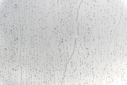 water drops on glass after rain for background.