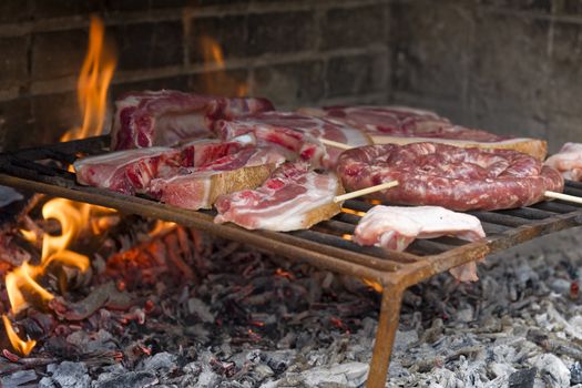 Meat roast in the barbecue in the countryside