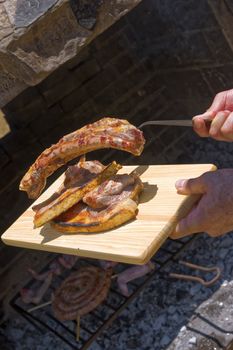 Meat roast in the barbecue in the countryside