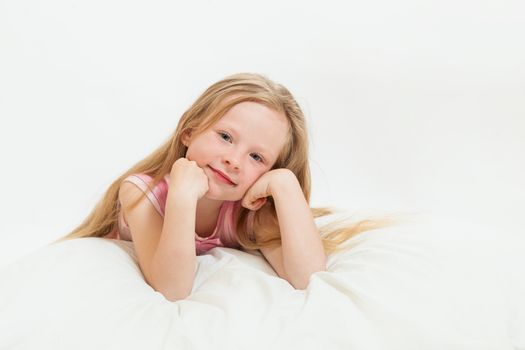 the beautiful little girl on the isolated background