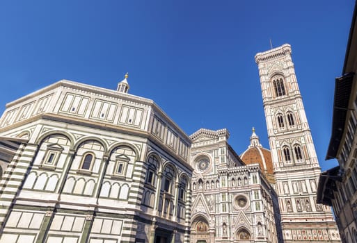 Piazza del Duomo, in Florence, Italy with the Basilica di Santa Maria del Fiore, Giotto's Campanile and the Baptistery of San Giovanni